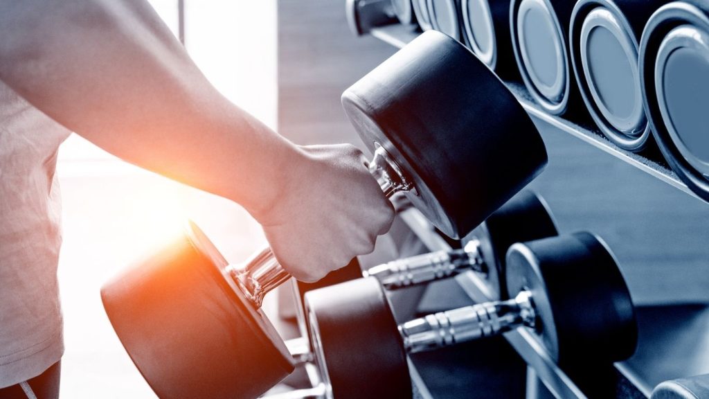 Man Holding Dumbbell